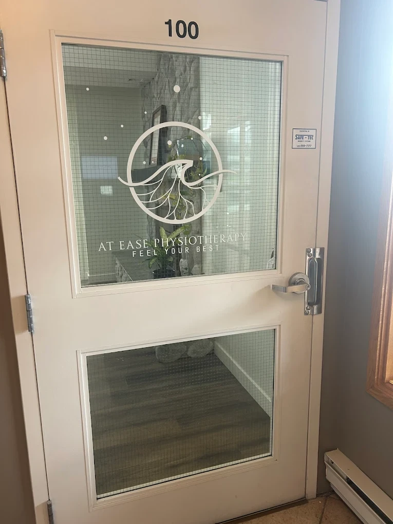 At Ease Physiotherapy entrance door with logo - Unit 100 at South Surrey